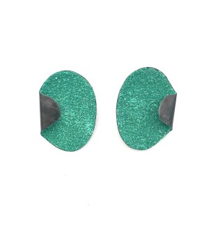 oxidized Sterling silver earrings with textured green coating and fold.