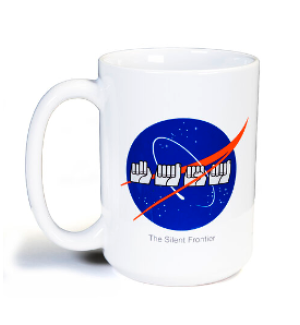 Coffee mug with graphic representations of American Sign Language letter signs spelling out NASA overlaid on the NASA logo.