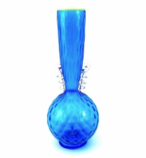 A blue glass vase with a lime green rim, the base is spherical with a cylindrical mouth.