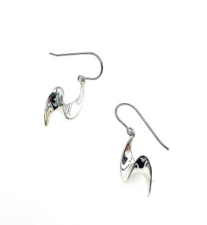 A pair of wave shaped silver earrings.