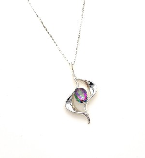 a silver ogee shaped pendant with a multi colored gem stone.