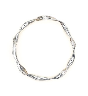 a circular undulating silver bracelet.