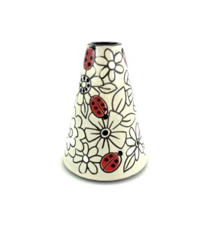 A cone shaped ceramic vase with a white background, hand illustrated flowers and red lady bugs.