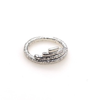 a silver textured ring band with added pieces to make it look like a stacked pryramid.
