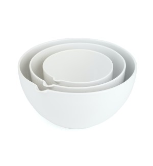 a set of three smooth white ceramic mixing bowls in graduated sizes to nest together.