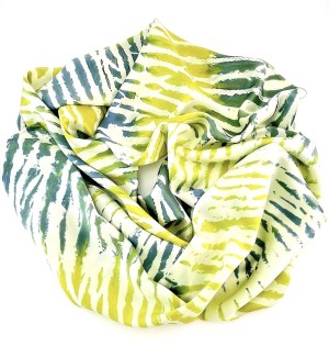 a silk fabric scarf with dashes of lime green and slate blue arranged in a circle. 