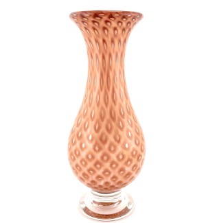 a hand blown teardrop shaped glass vase with a diamond pattern of apricot across the surface.