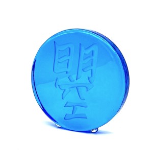 a blue round glass disc with the Chinese character 'Bright and Ambitious'. 