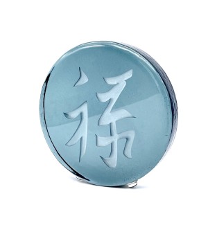 a round grey glass disc with the chinese charater 'Wealth and Posterity'.