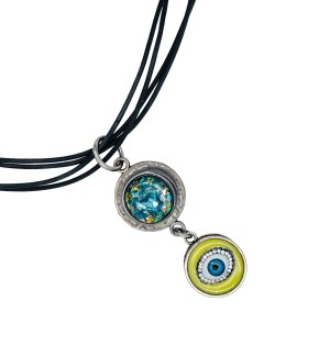 a dynamic and bold pairing of pendants made from glass shards set in resin with a cameo drop set with a glass eye. 