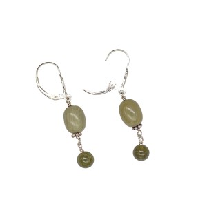 a pair of earrings with sage green hued and polished jasper and garnet stone accented with a Sterling finding.