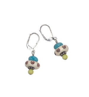 a pair of earrings with a faceted turquiose colored bead, a white disc and a smll citrus green round bead. 