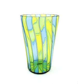 a glass tumbler cup with a complex pattern of vertical bands of translucent alternating colors of lime yellow and light turquoise.