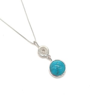 a round turquoise and silver pendant with a box chain.