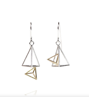 a pair of Sterling silver and gold earrings formed by 3D triangle forms paired asymmetrically.