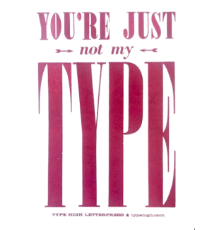 Letterpress Print that says 'You're Just Not My Type' in red ink with two small decorative arrows.