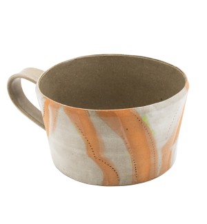 stoneware mug with stripes of orange and elements of green