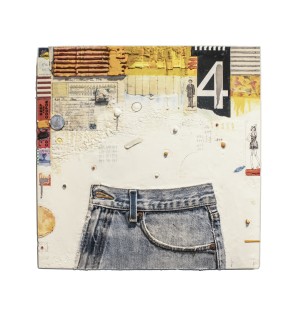 an abstract textural encaustic painting with complex patterns and symbols etched in a white surface background and a partial pair of blue jeans applied to the bottom half.
