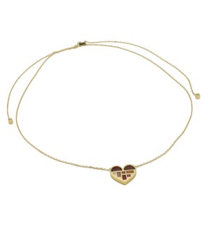 a gold necklace in the shape of a heart adorned with gemstones, including ruby