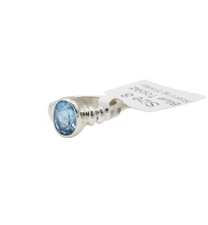 a sterling silver blue topaz ring with a bubble bezel