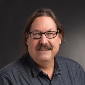 Headshot of Denis Defibaugh