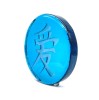 a round blue glass disc with the Chinese character for 'Love'.