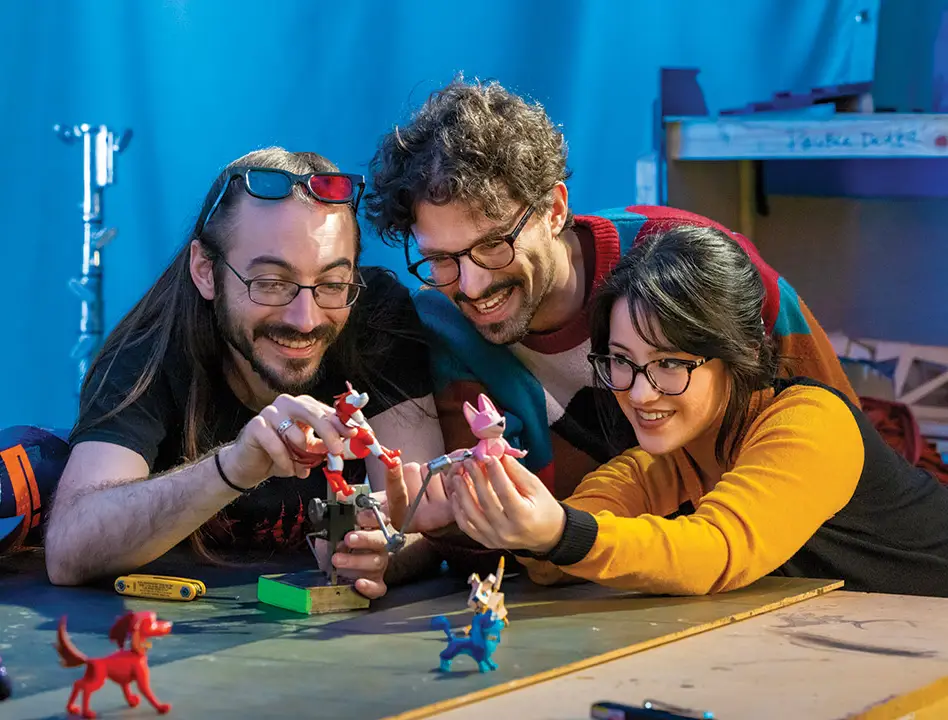 From left, Sean Malony ’12, Max Lopez ’12, and Cami Kwan ’15 recently launched their new series, 'Ruff Ruff Danger Dogs'. The series leans into the trio’s earnest approach to animation, which they credit to the minor in philosophy they all completed at RIT.