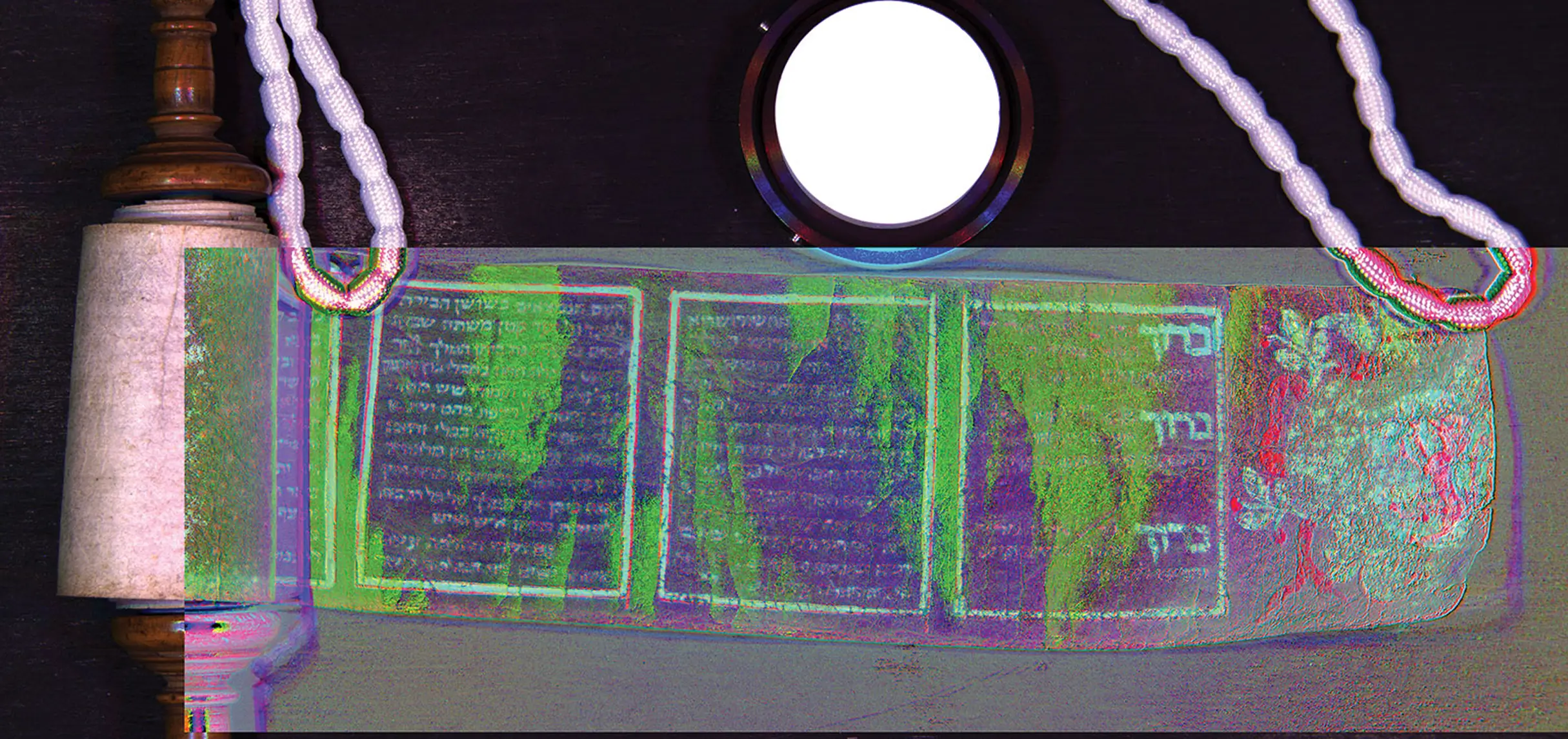 The Book of Esther scroll scanned by MISHA, showing, revealing lost text and features from a coat of arms.
