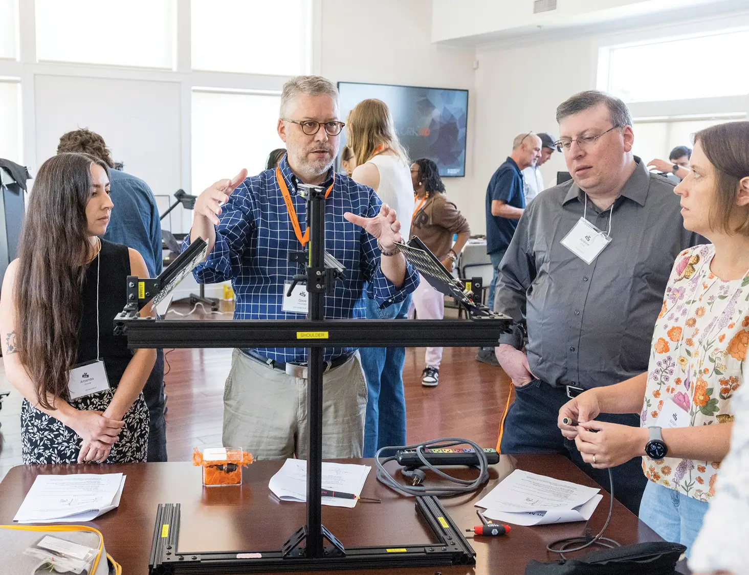 David Messinger explaining how MISHA works to a group of people at a seminar.