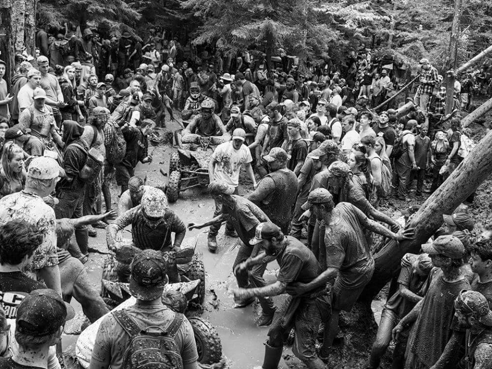 A photo taken by Rebecca Soderholm showing people participating in an off-road ATV race with dozens more watching.