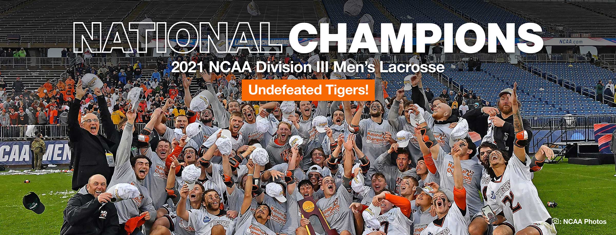 RIT men’s Lacrosse team celebrating 2021 Division III championship win