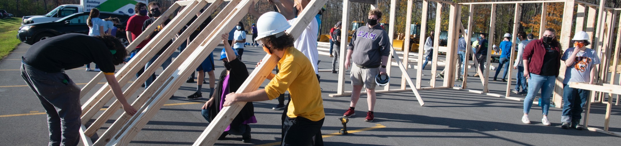 Students framing a house