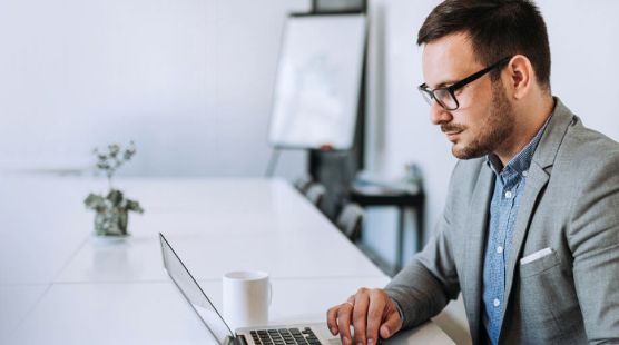 Man looking at computer screen