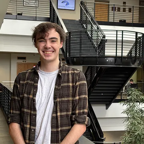 Luke Whited, creator of REDSHIFT, posing for a photo.