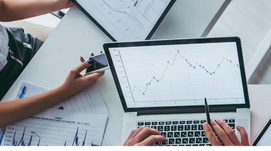 Computer with a line graph on it