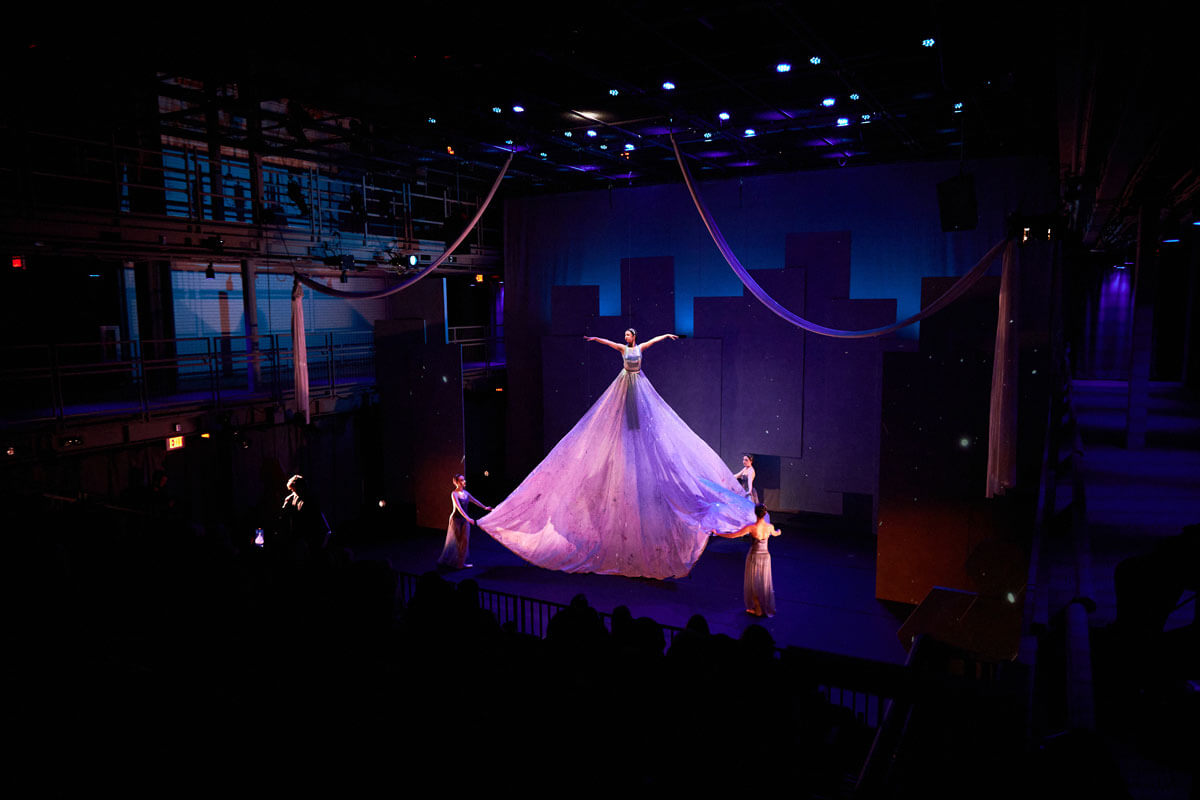 Dancers performing in the Glass-Box Theater.