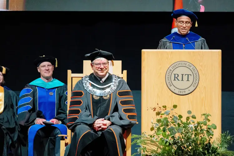 R I T President, William H. Sanders, sitting during the inauguration ceremony.