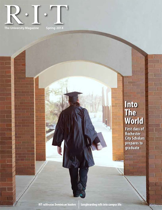 Graduate walking on campus