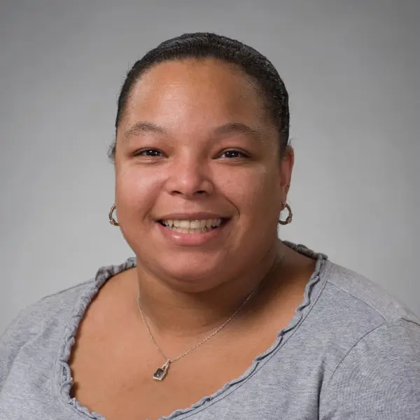 Headshot of Thomastine Sarchet-Maher.