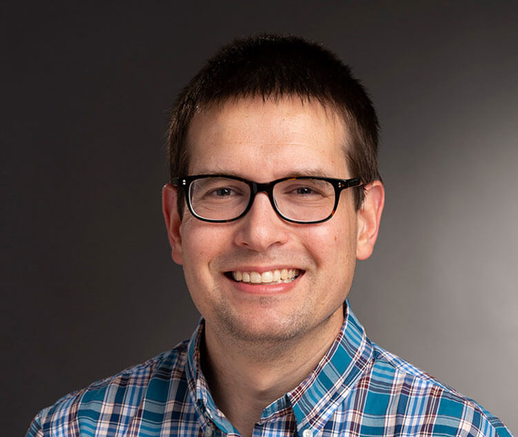 Headshot of Ben Zwickl.