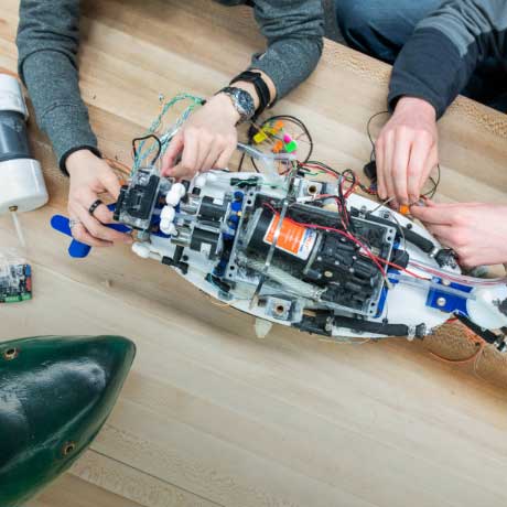 Students working with electronics