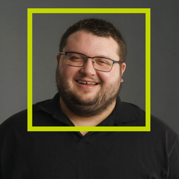 Headshot of Garret Morkin with a green border around his face.