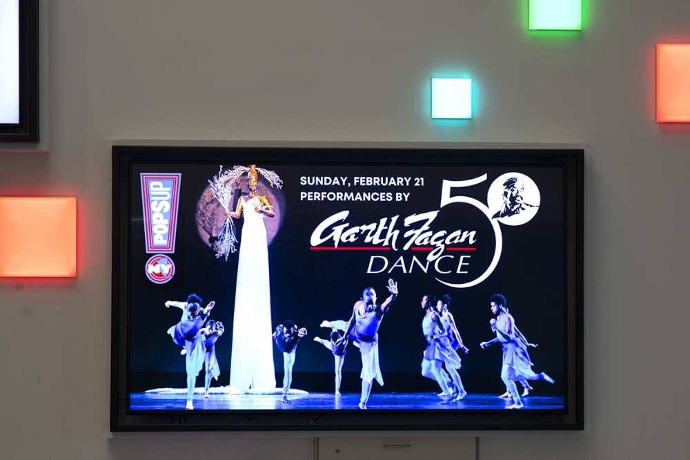 promotion of performing arts event displayed on TV screen.