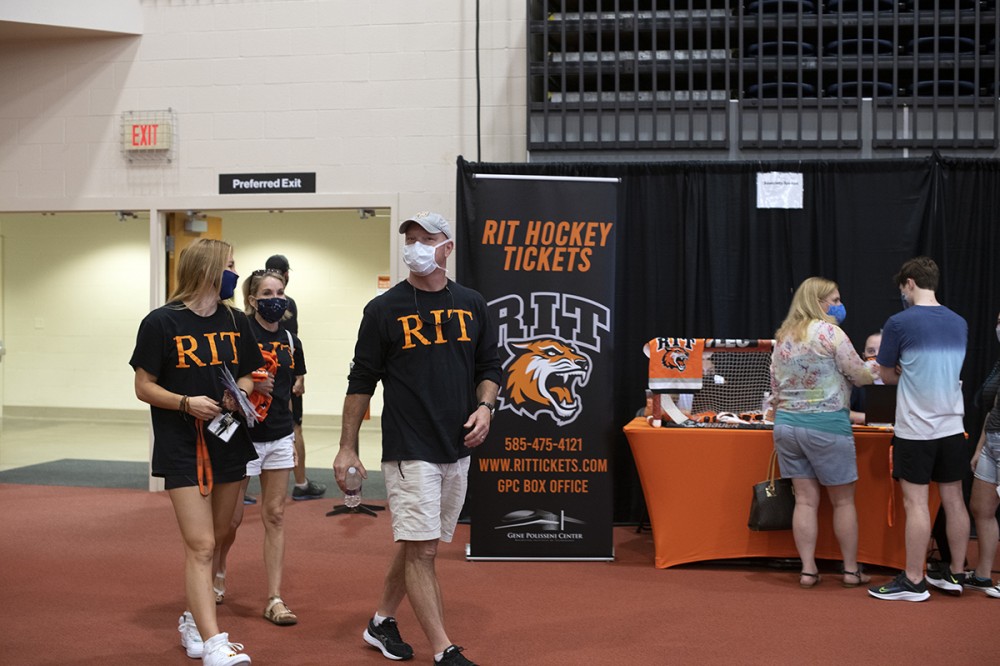 people walking  into Resource Fair