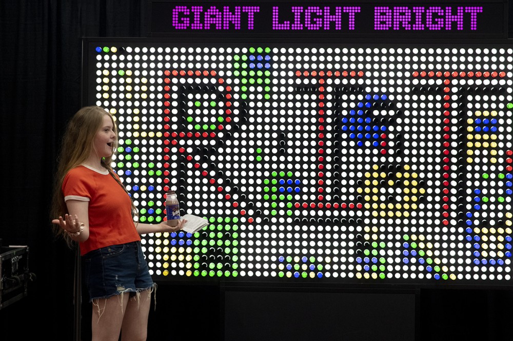 student and RIT sign