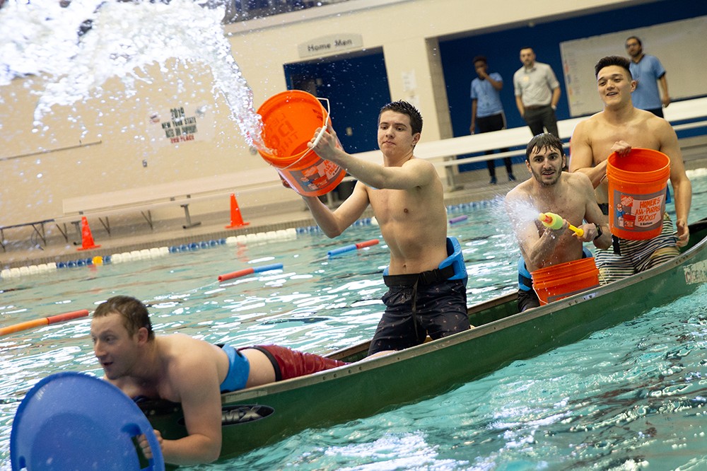 <p>Intramurals set&nbsp;up a canoe battleship tournament in the Field House competition pool April 28. Teams of four people in a canoe with buckets try to fill the other canoes and sink them.&nbsp;</p>
