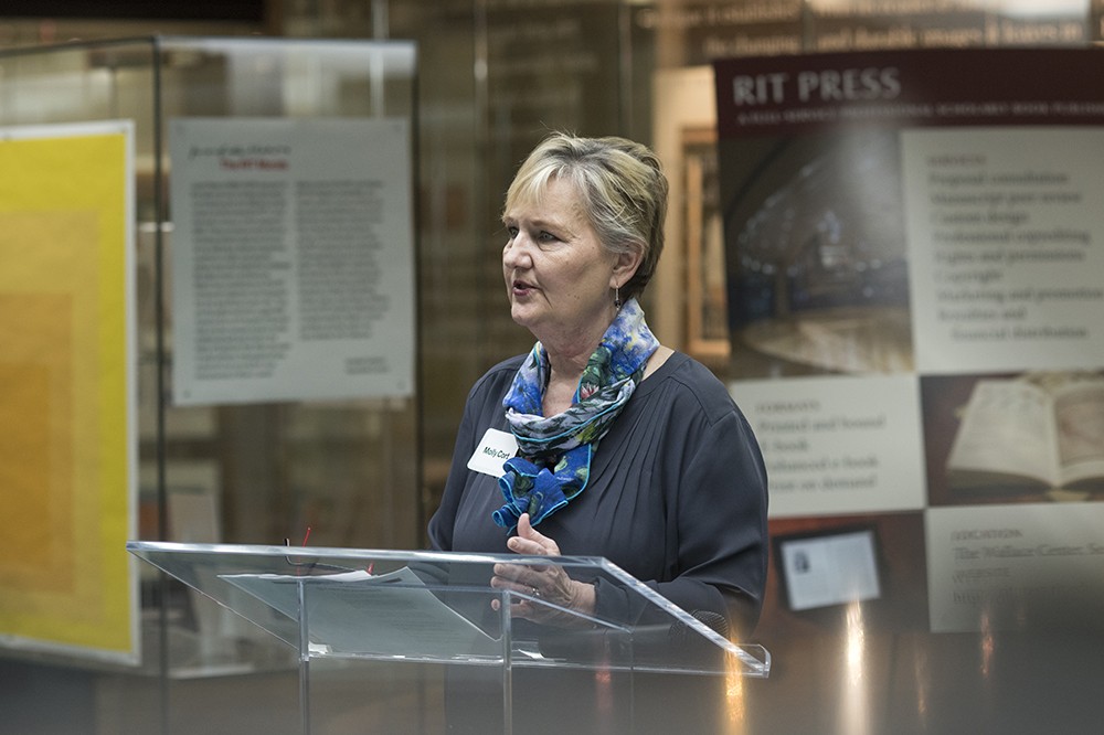 female speaker at podium