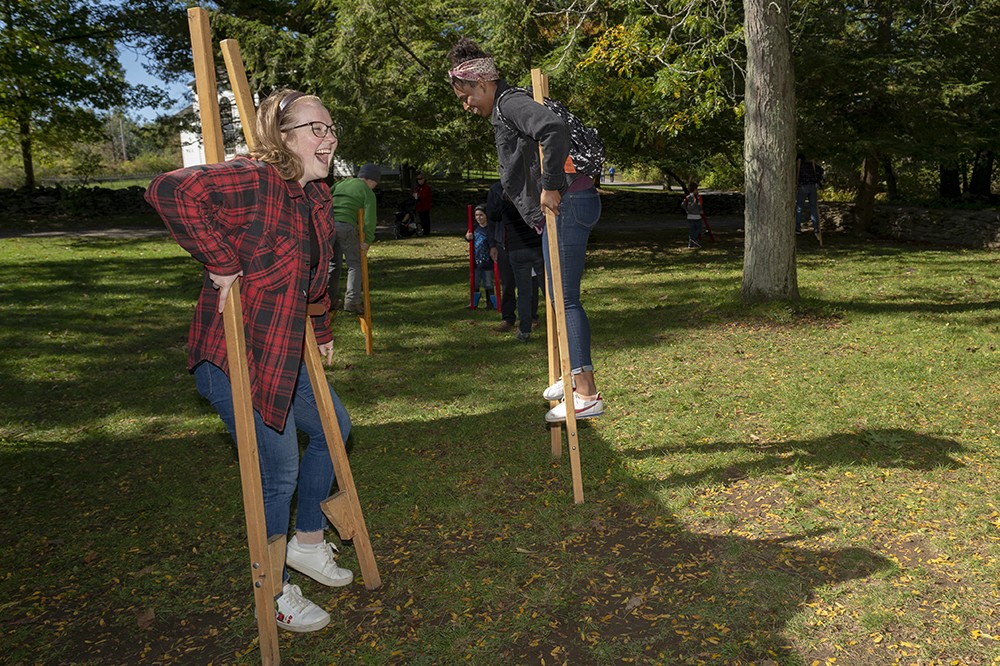 <p>From left, College of Liberal Arts students Lizzy Carr and Brie Johnson-Morris attend the Fall Festival &amp; Agricultural Fair at the Genesee Country Village &amp; Museum in Mumford. RIT was recently given a gift of $1.3 million to solidify the partnership between the university and museum to allow students and faculty to conduct research and collaborate on projects.&nbsp;</p>
