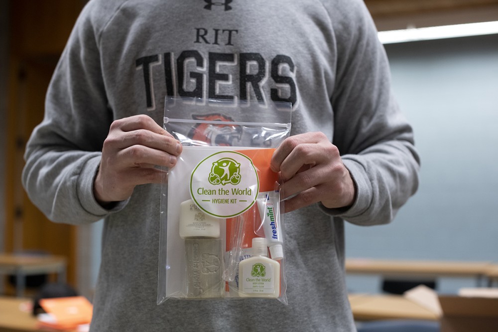 hands holding package