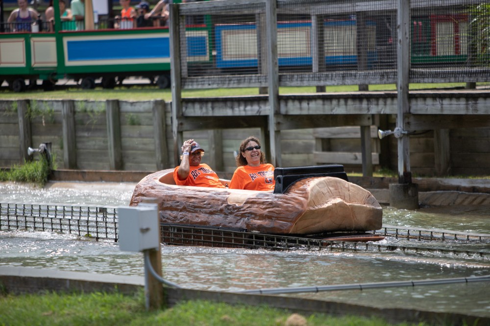 two people on the log flume ride at Seabreeze Amusement Park.
